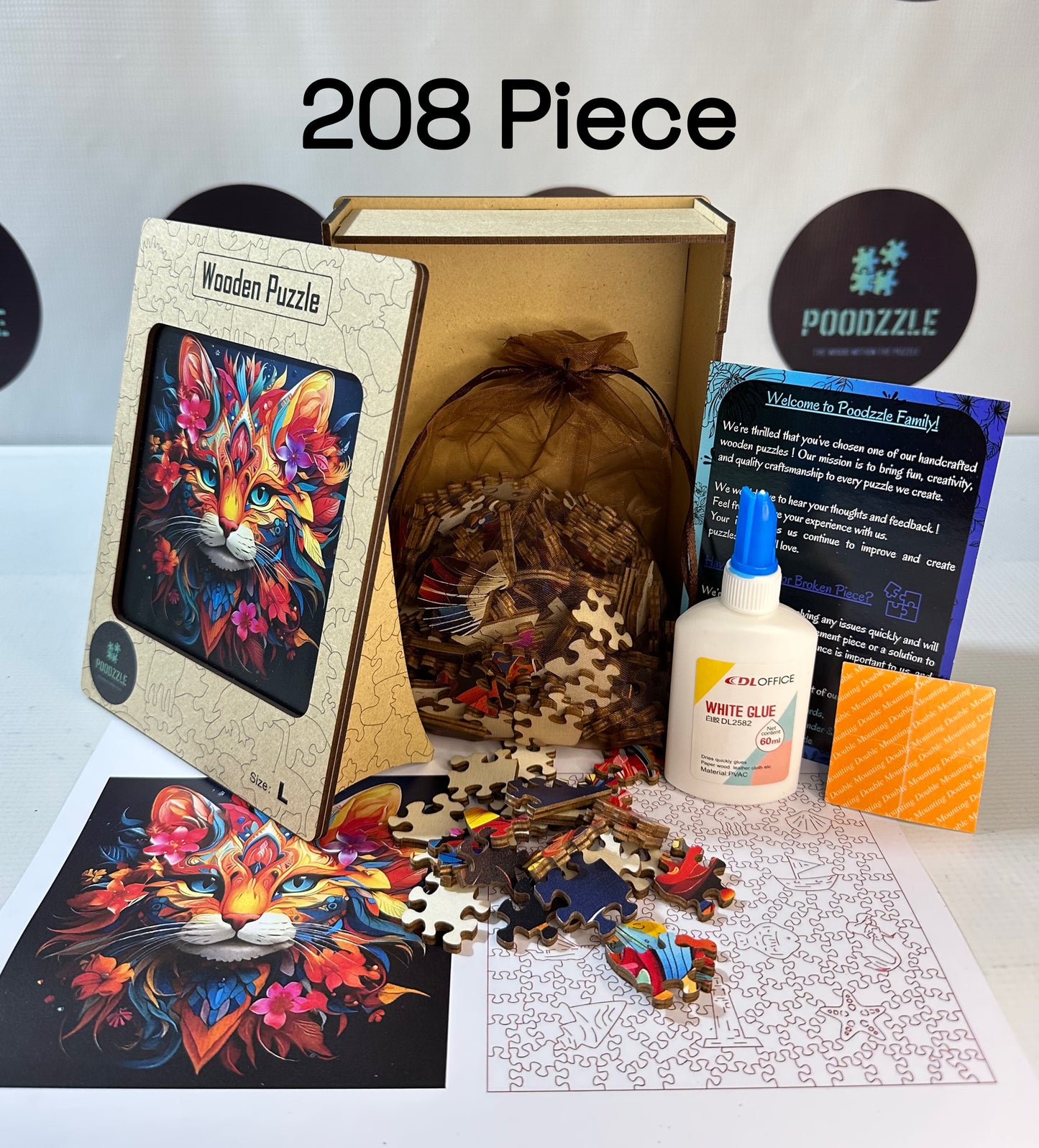 208 piece wooden puzzle set with packaging, glue, and instructions on a white surface.