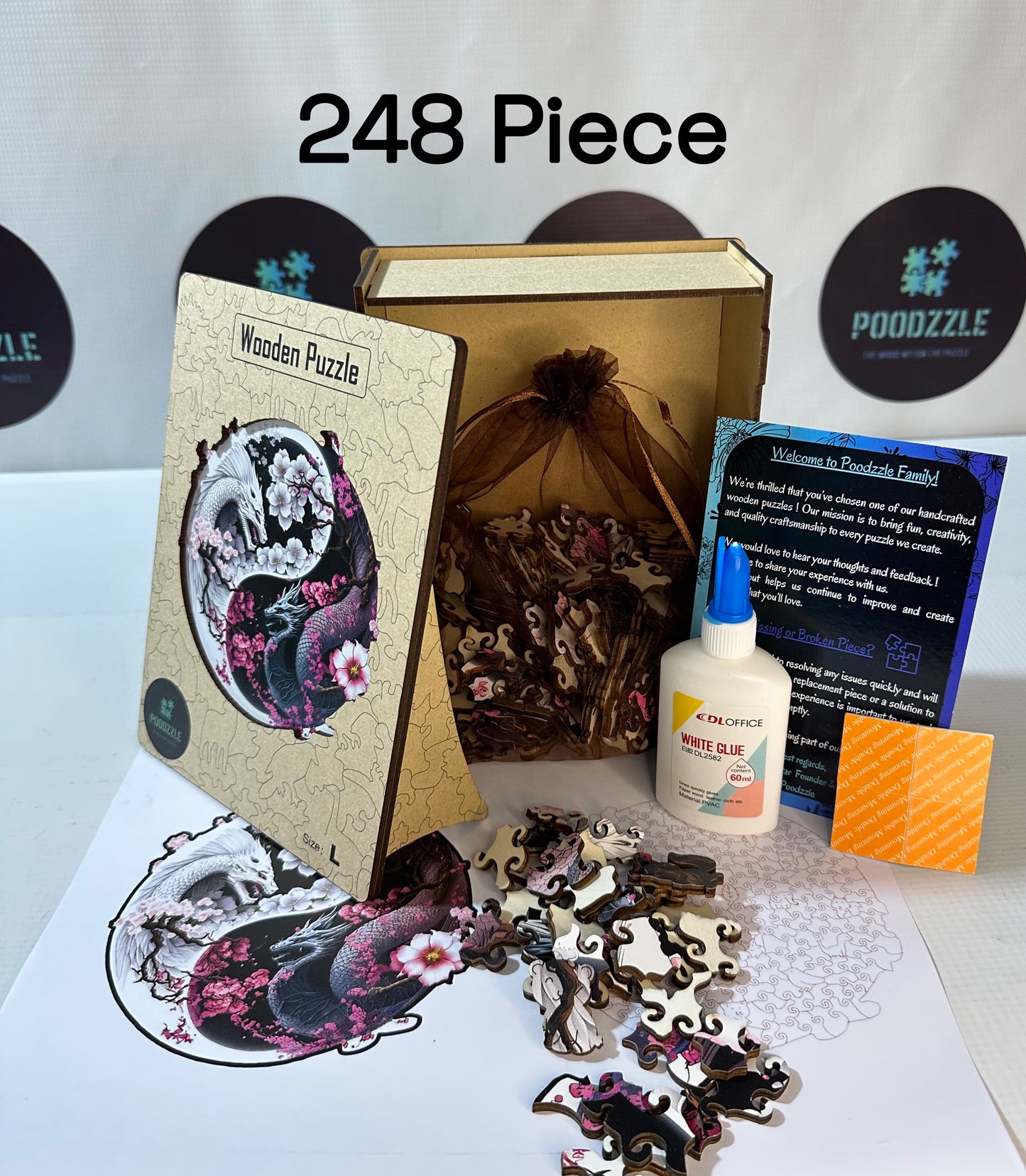 Wooden puzzle with packaging and pieces on a table